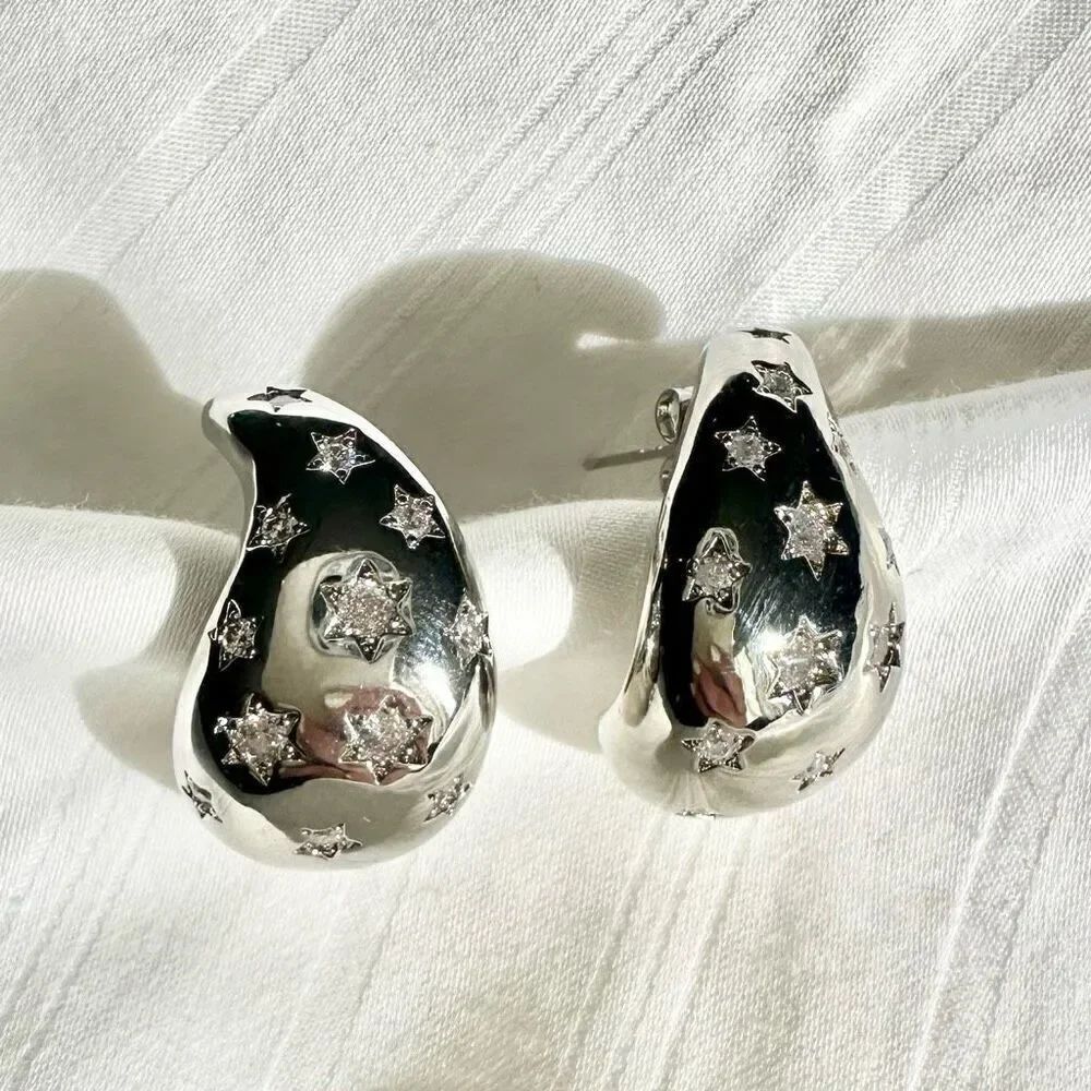 Silver mod style star earrings